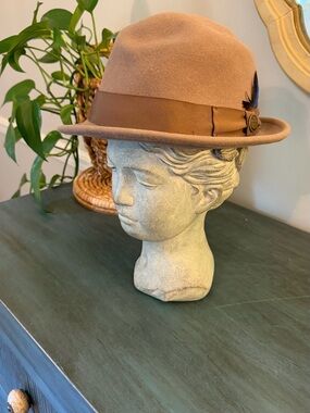 Goorin Bros Fedora with tonal grosgrain band and feather detail.